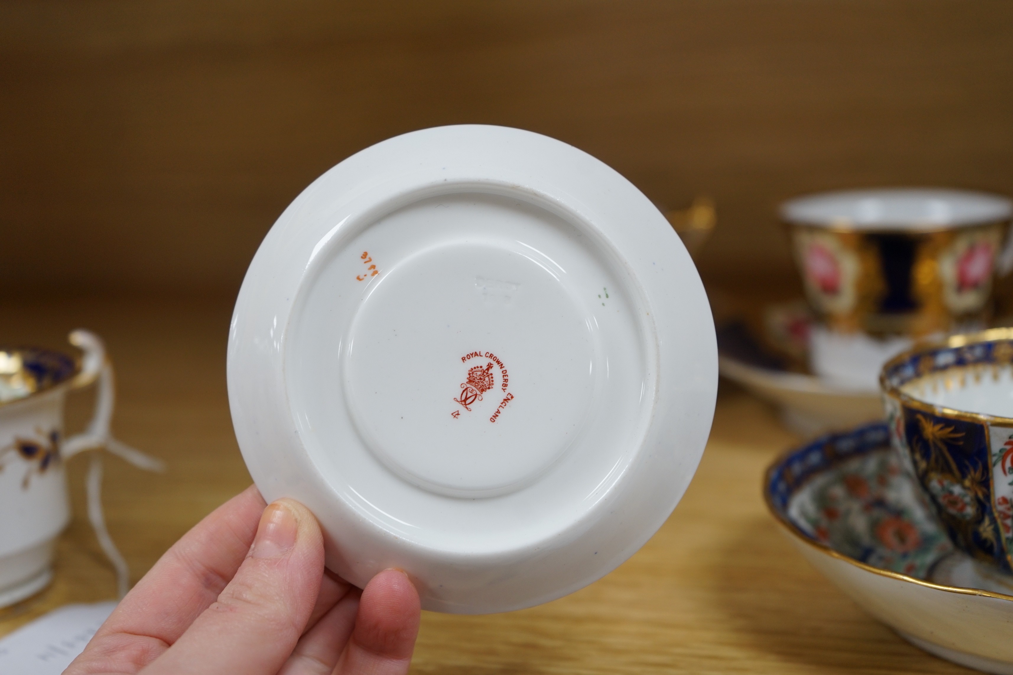 A selection of various English porcelain tea cups and saucers, to include Barr Flight Barr